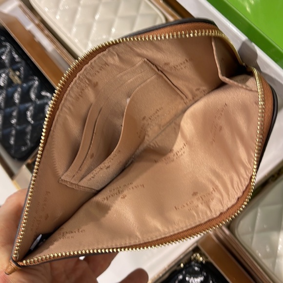 Kate Spade Medium Lucy L-Zip Wristlet Pebble Leather 

Warm Gingerbread 
NWT - Picture 9 of 16